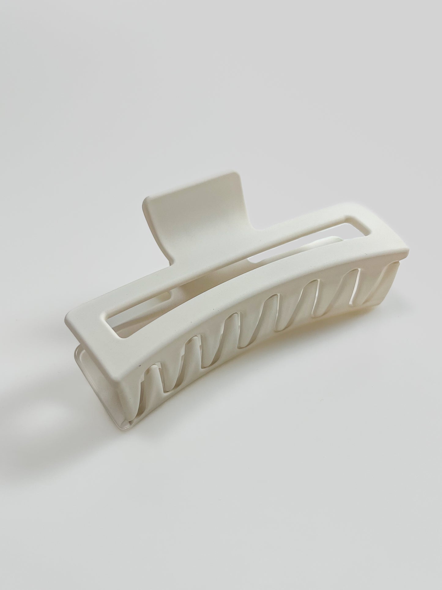 Rektangulärformad hårklämma