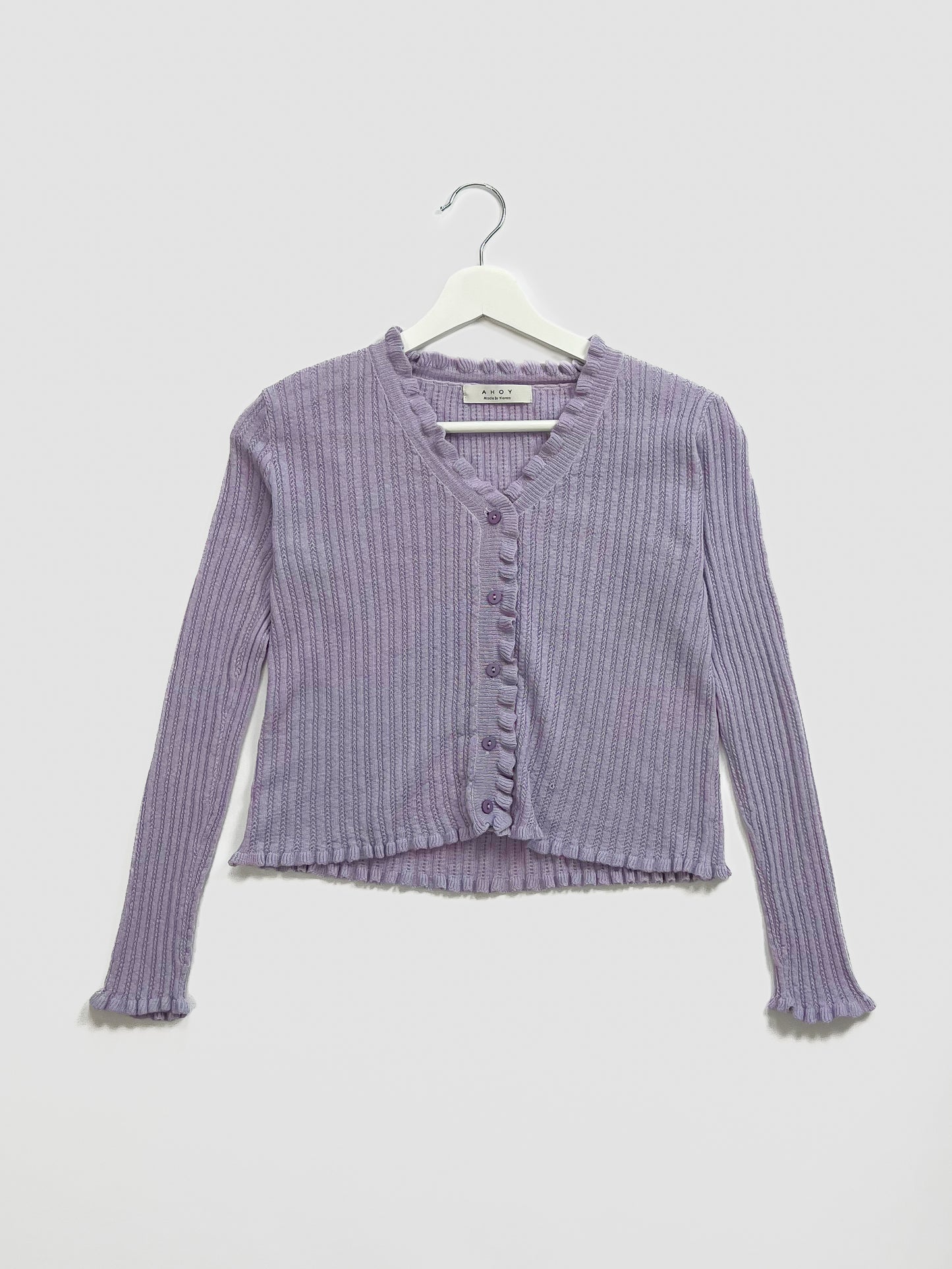 Ribbstickad tröja med knappar