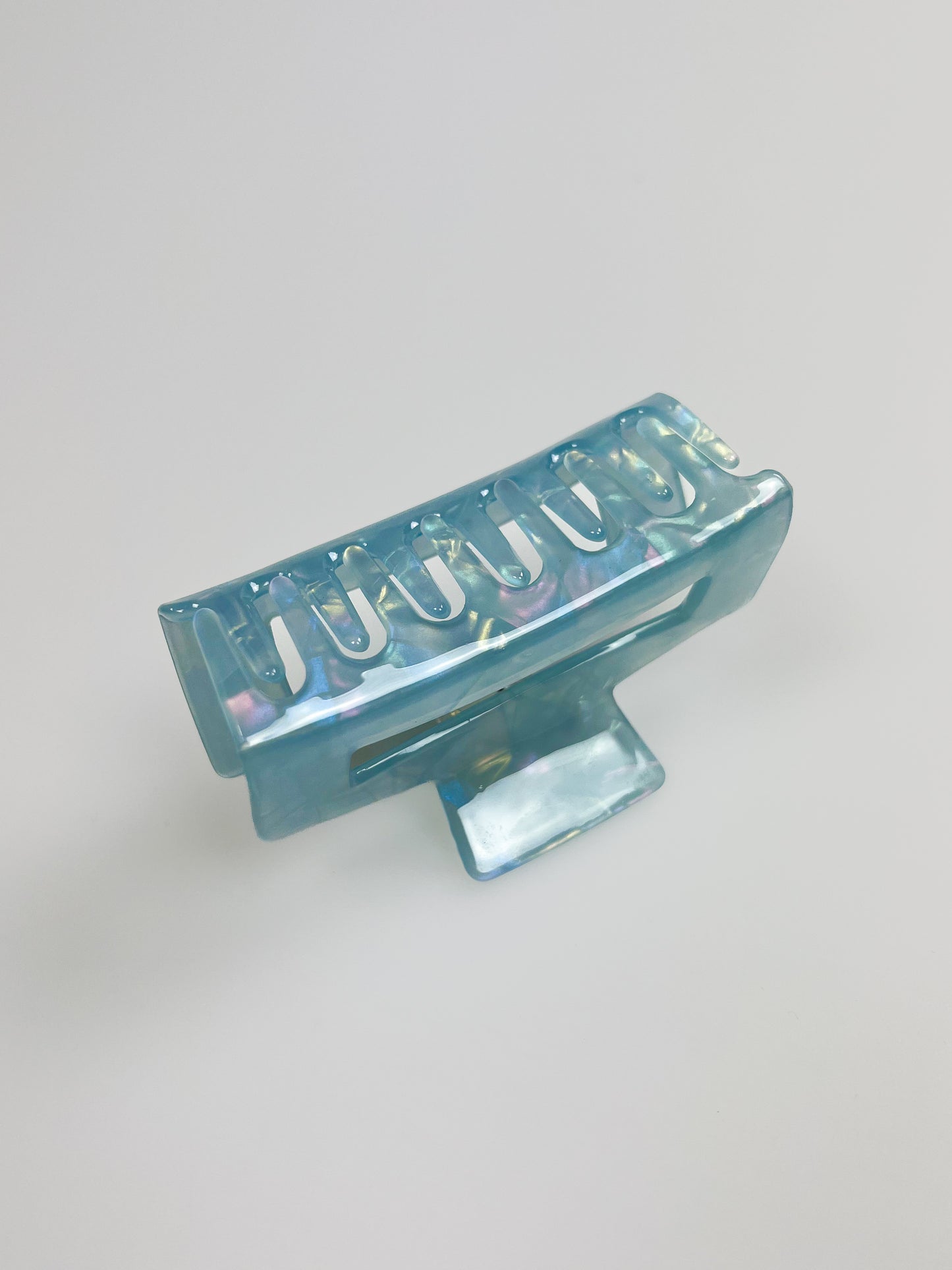 Holographic hårklämma