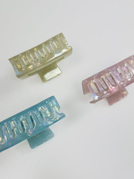 Holographic hårklämma